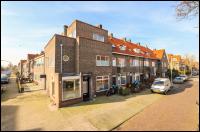 Breda, Magnoliastraat 26, 26a en Eikstraat 1